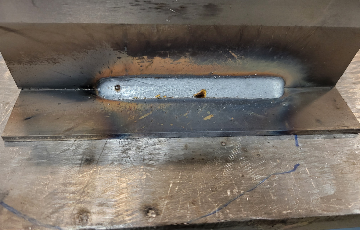 Bad weld caused by high amps or too low travel speed.